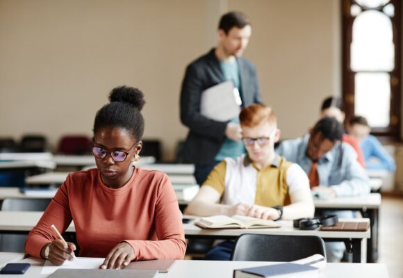 Students Taking Exam in Classroom